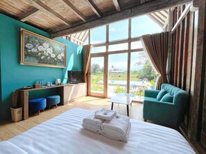 Exclusive Villa | Living area | TV - Nglaras Resort Yogyakarta (Ngaglik)