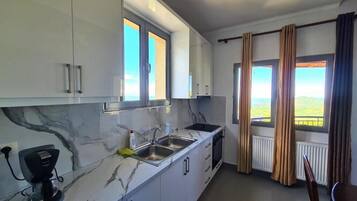 Suite, Balcony, Mountain View | Private kitchen