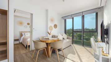 Exclusive Apartment, 2 Bedrooms, Balcony, Golf View | Living room | TV