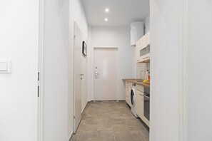 Estúdio básico | Cozinha privada | Frigobar, cooktop, talheres/pratos/utensílios de cozinha