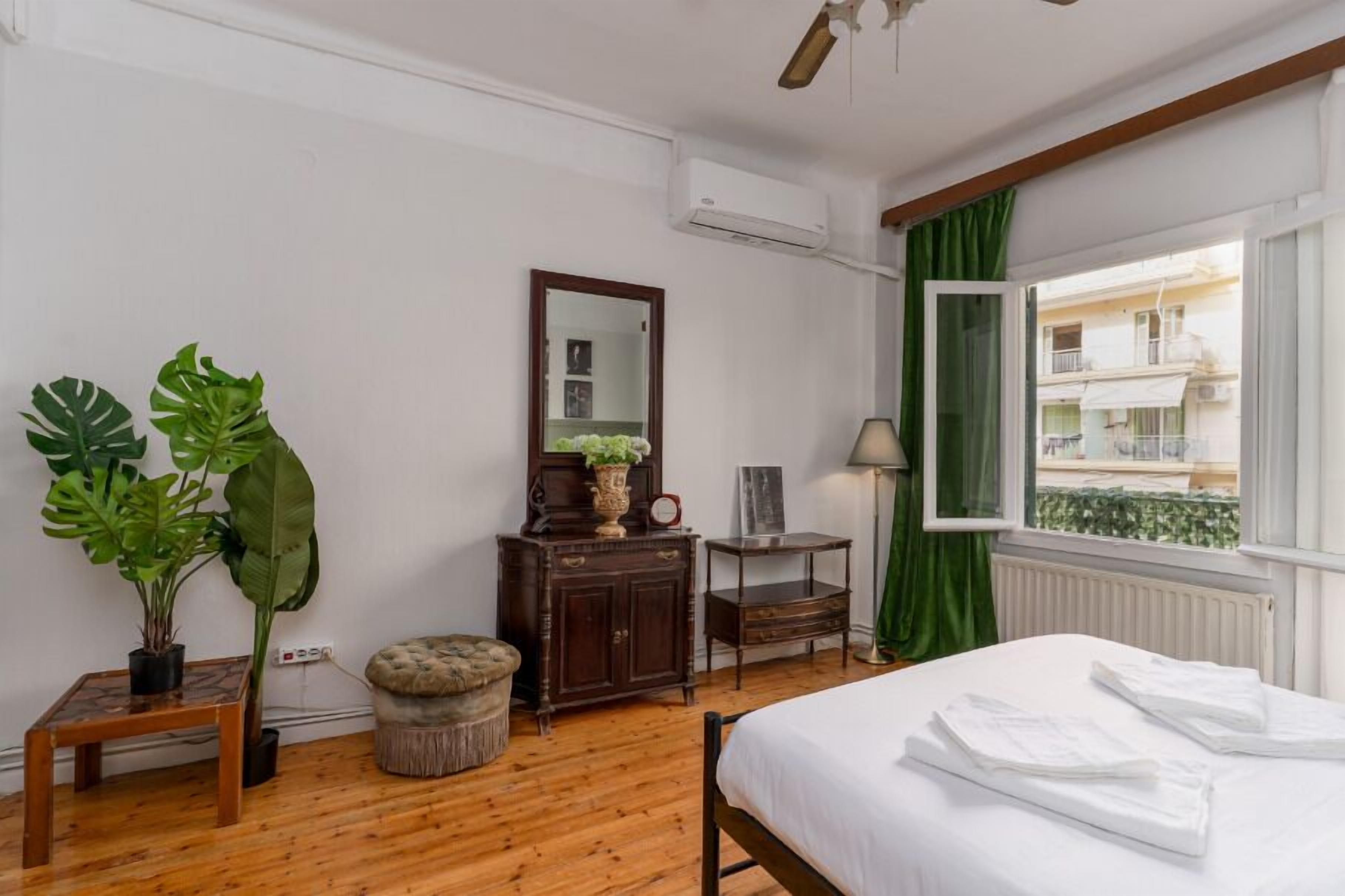 Apartment, 2 Bedrooms, Balcony | Desk, laptop workspace, blackout drapes, iron/ironing board