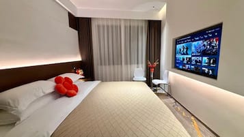 Premium bedding, down duvets, individually decorated