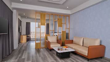 Suite presidencial | Zona de estar | Smart TV de 60 pulgadas con canales por cable