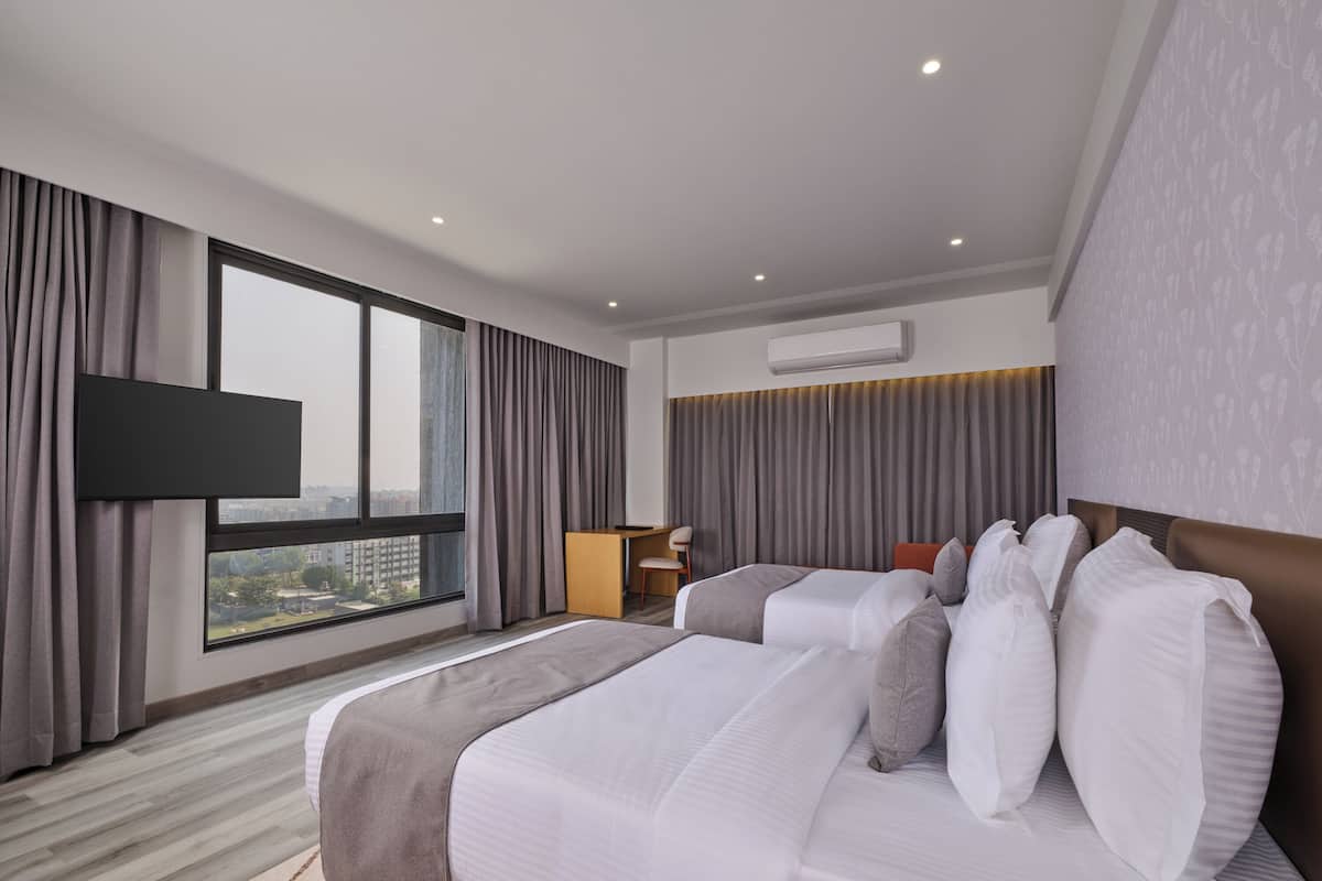 Superior kamer, 1 twee- of 2 eenpersoonsbedden | Een minibar, een kluis op de kamer, een bureau