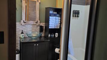 Hair dryer, towels, soap, shampoo