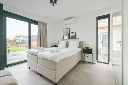 Luxurious 8-person villa with hot tub, sauna, spacious waterfront garden with barbecue and private jetty – perfect for ultimate relaxation and comfort.