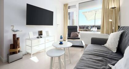 Modern vacation apartment with side sea view and balcony in Marina Wendtorf