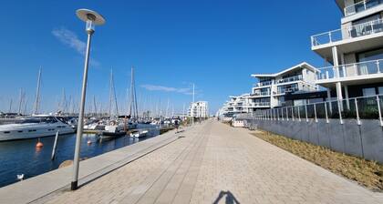 Modern vacation apartment with side sea view and balcony in Marina Wendtorf
