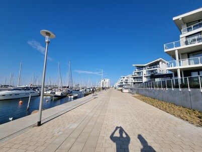 Modern vacation apartment with side sea view and balcony in Marina Wendtorf