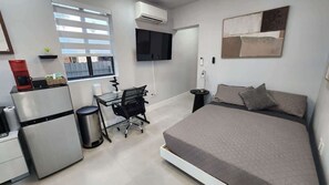 1 habitación, tabla de planchar con plancha, wifi gratis y ropa de cama 
