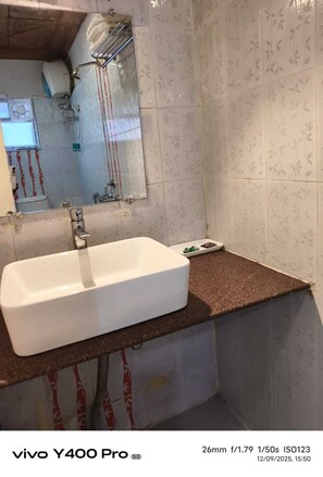 Shower, towels, soap, shampoo