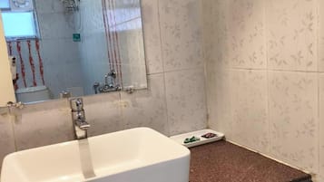 Shower, towels, soap, shampoo