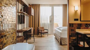 Premium bedding, down comforters, in-room safe, desk