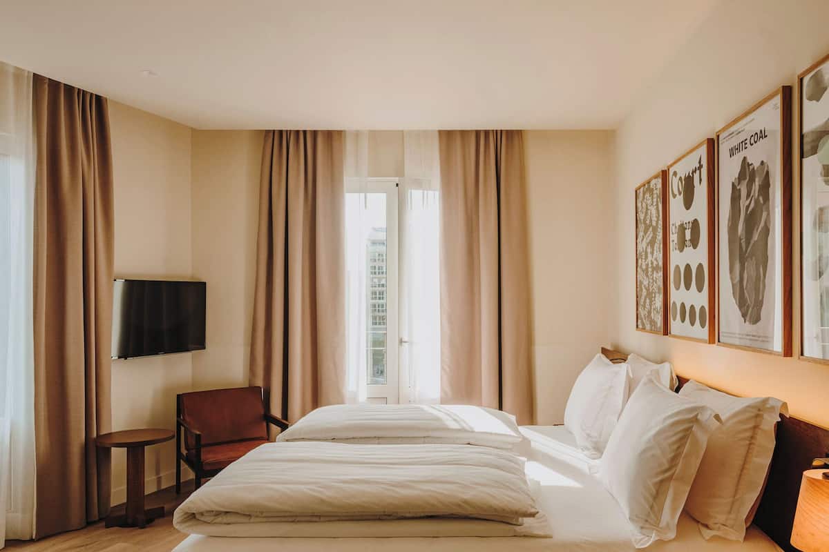 Superior Double Room, Balcony, City View | In-room safe, desk, laptop workspace, blackout drapes