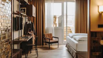 Premium bedding, down duvets, in-room safe, desk