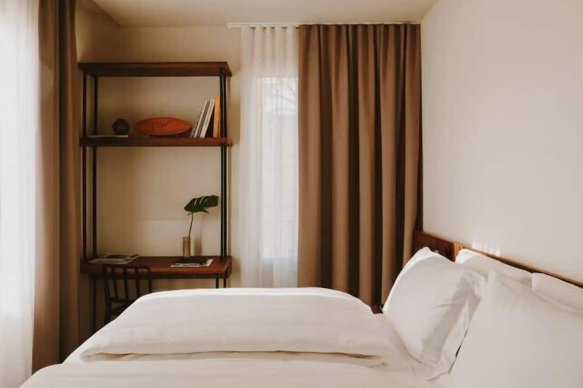 Premium bedding, down duvets, in-room safe, desk