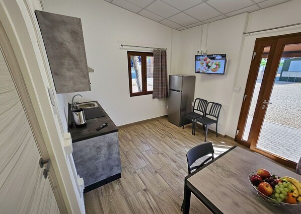 Bungalow, patio | Coin séjour