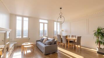Comfort Duplex, Balcony, City View | Living area | Flat-screen TV