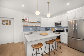Fridge, microwave, oven, stovetop - Brand new 2025 home in Alexandria. 3 bedrooms, 2.5 baths, with primary en-suite. Dedicated office with French doors. Finished basement rec room with arcade games—perfect for families! Private fenced yard. 10-min walk to King Street Metro + trolley (Alexandria)