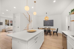 Interior - Brand new 2025 home in Alexandria. 3 bedrooms, 2.5 baths, with primary en-suite. Dedicated office with French doors. Finished basement rec room with arcade games—perfect for families! Private fenced yard. 10-min walk to King Street Metro + trolley (Alexandria)