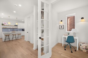 Interior - Brand new 2025 home in Alexandria. 3 bedrooms, 2.5 baths, with primary en-suite. Dedicated office with French doors. Finished basement rec room with arcade games—perfect for families! Private fenced yard. 10-min walk to King Street Metro + trolley (Alexandria)