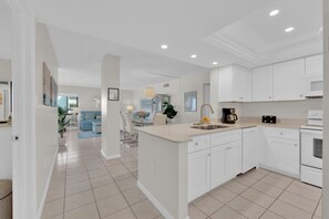 Fridge, microwave, oven, stovetop - Beachfront 3B/2B Sandarac Vacation Condo 702A. Direct gulf view! (Fort Myers Beach)