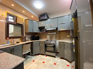Private kitchen - Spacious -2 bedroom apartment in adorable El Shikh Zaid with AC (El Shikh Zaid,)