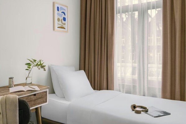 Habitación individual clásica | Caja de seguridad en la habitación y escritorio