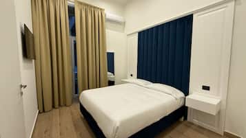 Doppia Comfort | Una scrivania, postazione laptop, insonorizzazione, ferro/asse da stiro