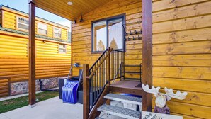A wooden cabin with a porch, a staircase, and a sign that reads "Just Hooves". - Brand New Scandinavian Cabin 5 Mi to Main St Breck (Breckenridge)