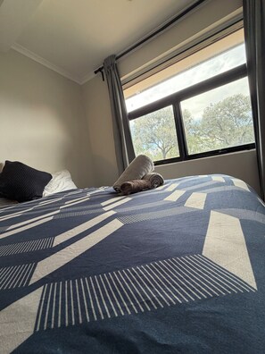 2 dormitorios, tabla de planchar con plancha, wifi gratis y ropa de cama