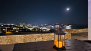 Front of property – evening/night - Aether Mykonos 3BR Port View Villa (Tourlos)