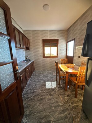 Family Apartment, Sea View | Private kitchen - ZAHA Appart (Ksar El Majaz)