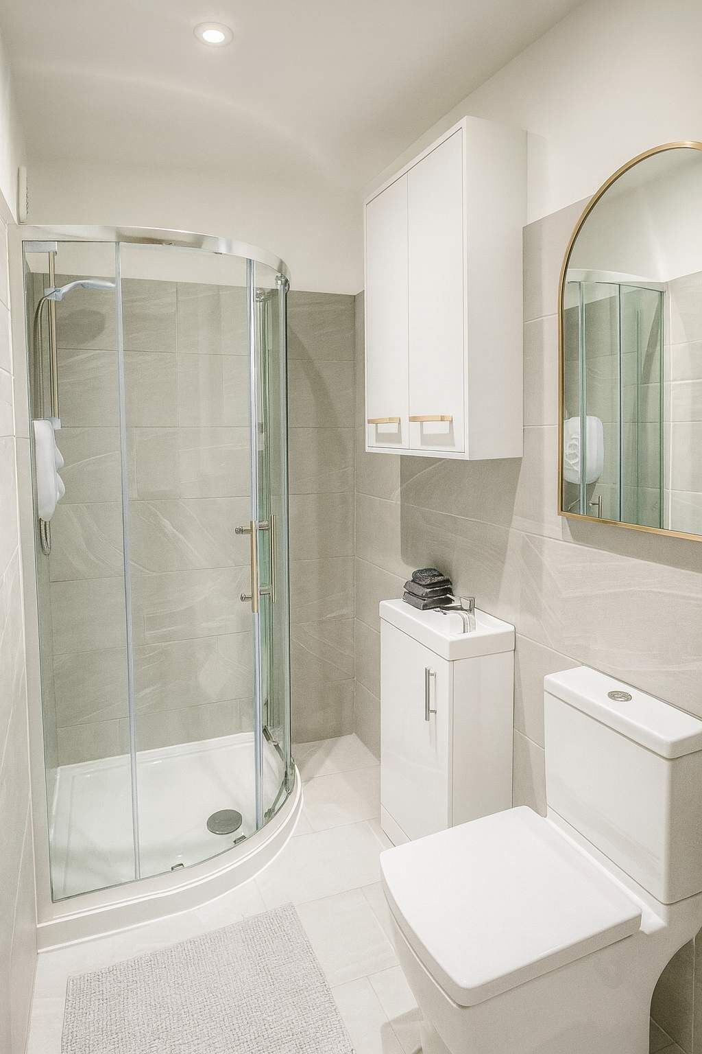 Shower, hair dryer, towels, shampoo