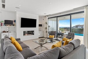 TV - Modern Villa Lynx with Sauna, Heated Infinity Pool, and Garden (Las Lagunas de Mijas)