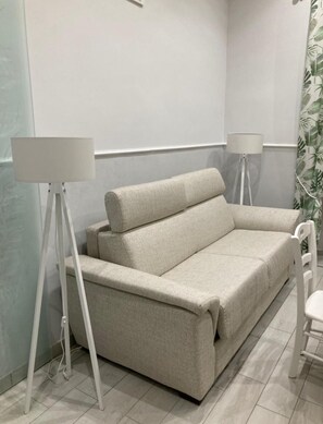 Living area - Lucy vacation home studio apartment located within walking distance from port of torre del greco (Torre del Greco)
