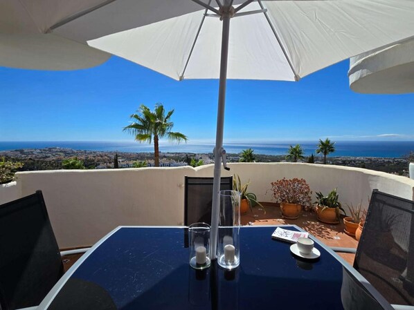Outdoor dining - Spectacular Sea Views, Pool & Garden – Calahonda Apartment for 6 (Sitio de Calahonda)
