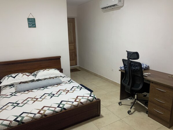 Room, 1 Queen Bed, Microwave | Desk, iron/ironing board, free WiFi - Chapel Hill 2-Bedroom Apartment (Takoradi)