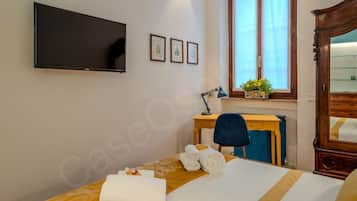 1 chambre, fer et planche Ă repasser