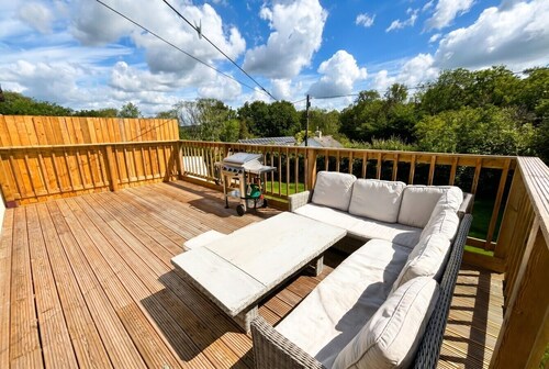 Family-friendly countryside home with hot tub, swing set and trampoline