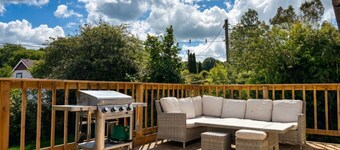 Family-friendly countryside home with hot tub, swing set and trampoline