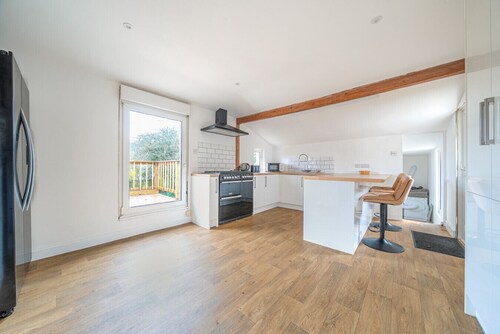 Family-friendly countryside home with hot tub, swing set and trampoline