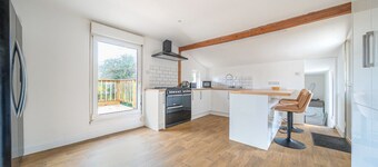 Family-friendly countryside home with hot tub, swing set and trampoline