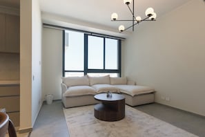 Smart TV - Cozy Luxury Studio in AEON Towers, Near Mall of Arabia (Agouza)