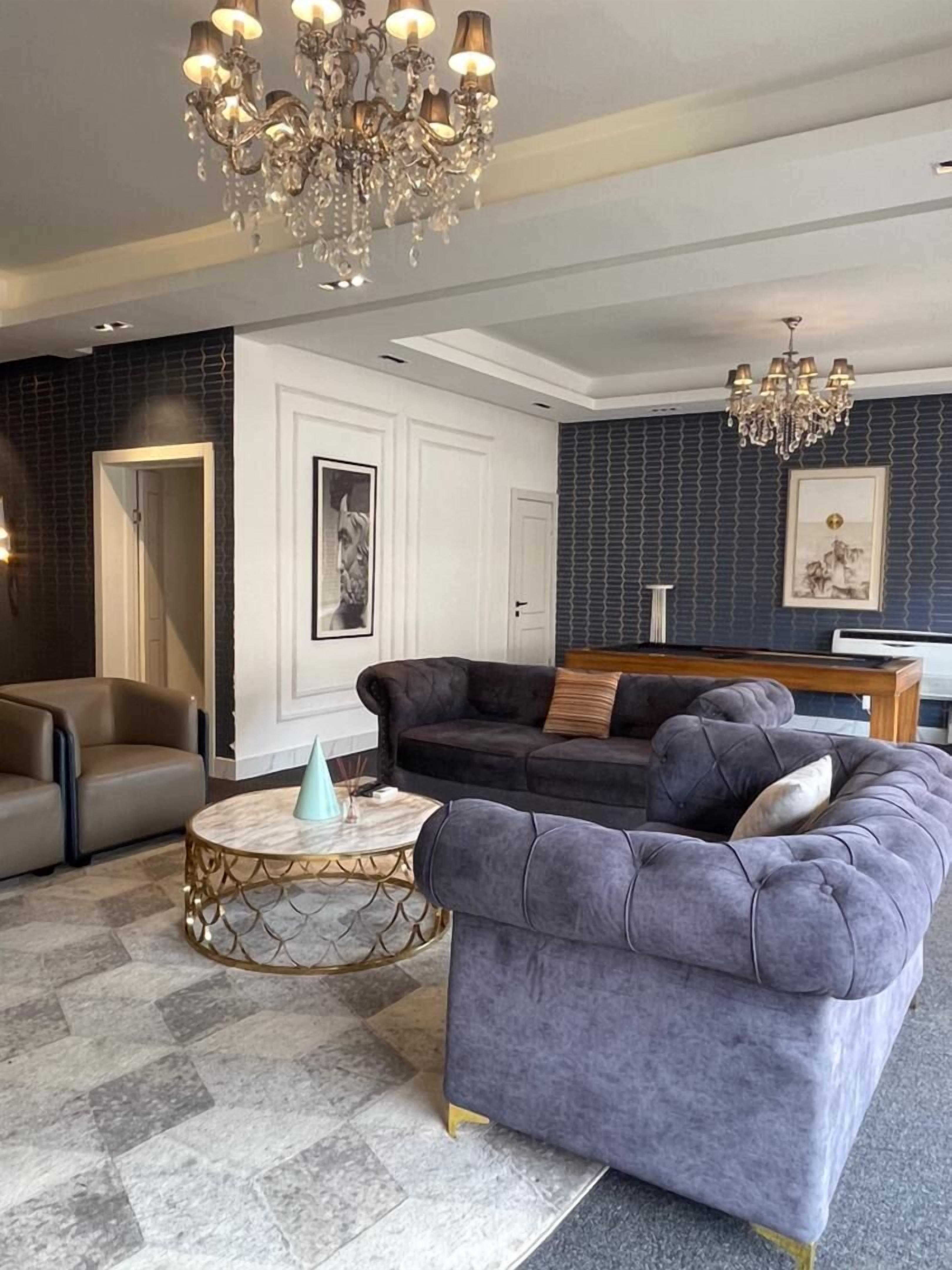 Executive Apartment | Living area | 6-inch LED TV with satellite channels, Netflix, streaming services