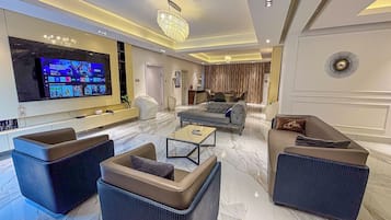 Family Apartment, 3 Bedrooms, Non Smoking, Kitchen | Living area | 6-inch LED TV with satellite channels, Netflix, streaming services