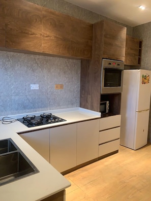 Luxury Apartment, Balcony, Pool View | Iron/ironing board, free WiFi - Sujimoto Residences Precious (Lagos)