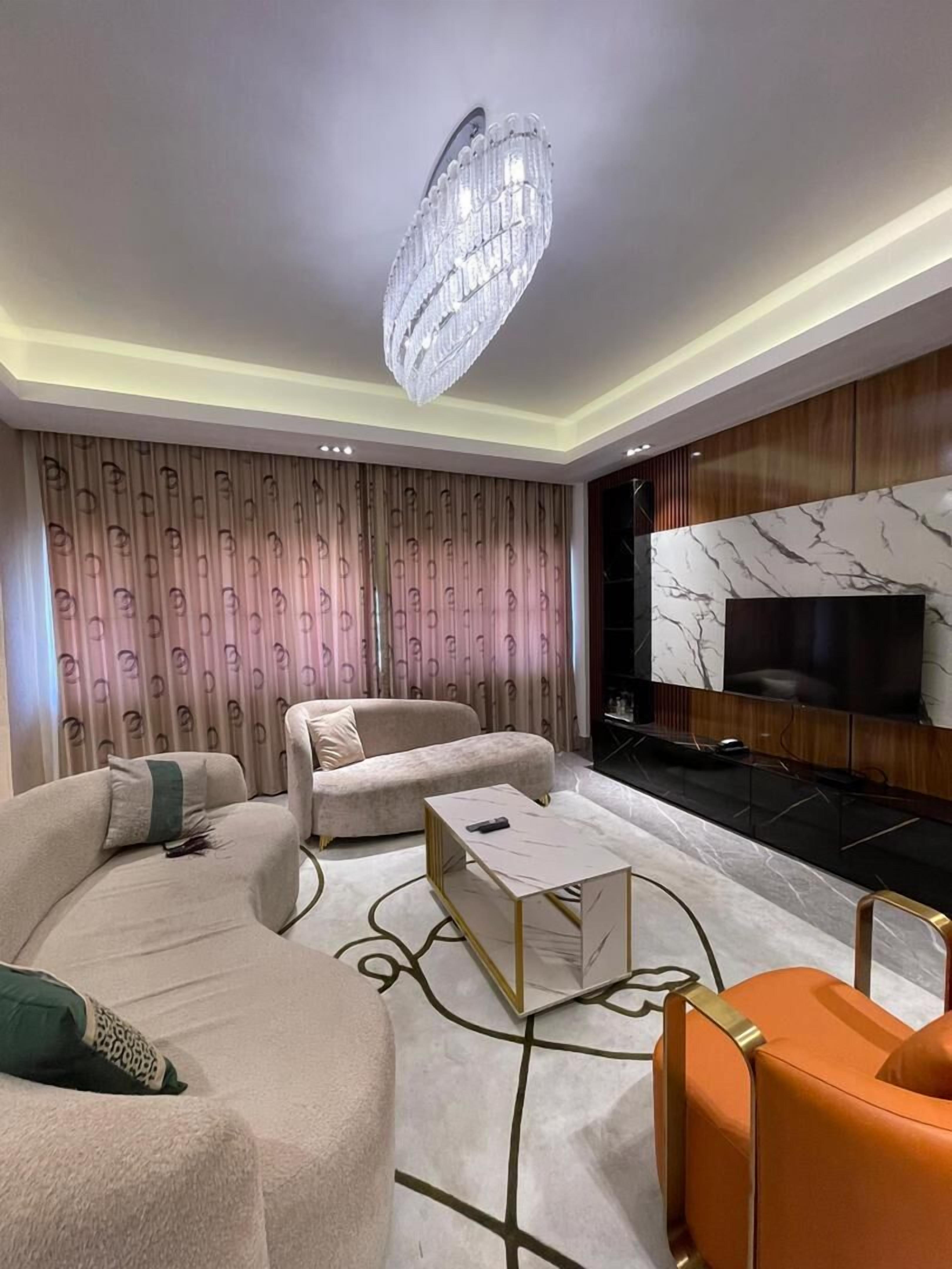 Business Apartment | Living area | 6-inch LED TV with satellite channels, Netflix, streaming services