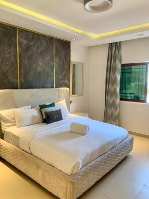 Luxury Apartment, 1 Bedroom, Refrigerator & Microwave, Pool View | Premium bedding, laptop workspace, iron/ironing board, free WiFi - Sujimoto Residences Precious  (Lagos)