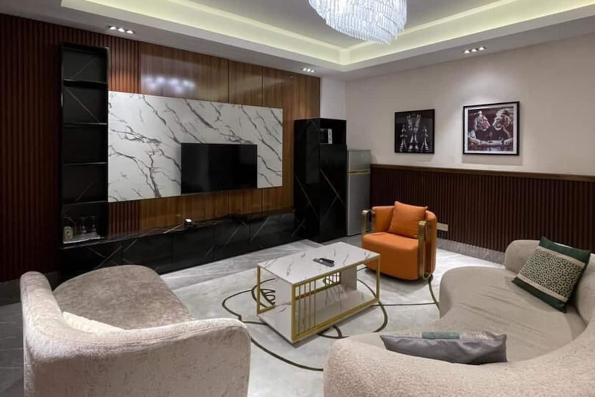 Luxury Apartment | Living area | 6-inch LED TV with satellite channels, Netflix, streaming services